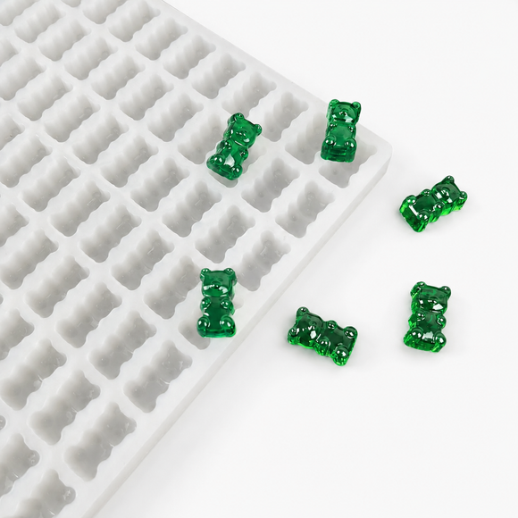 2.3mL gummy bear silicone mold with emerald green sample gummies on a clean white background