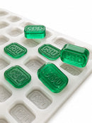 4 mL baksteen-gummivorm, 185 holtes — schuin zijaanzicht met doorschijnende smaragdgroene CBD-gummies